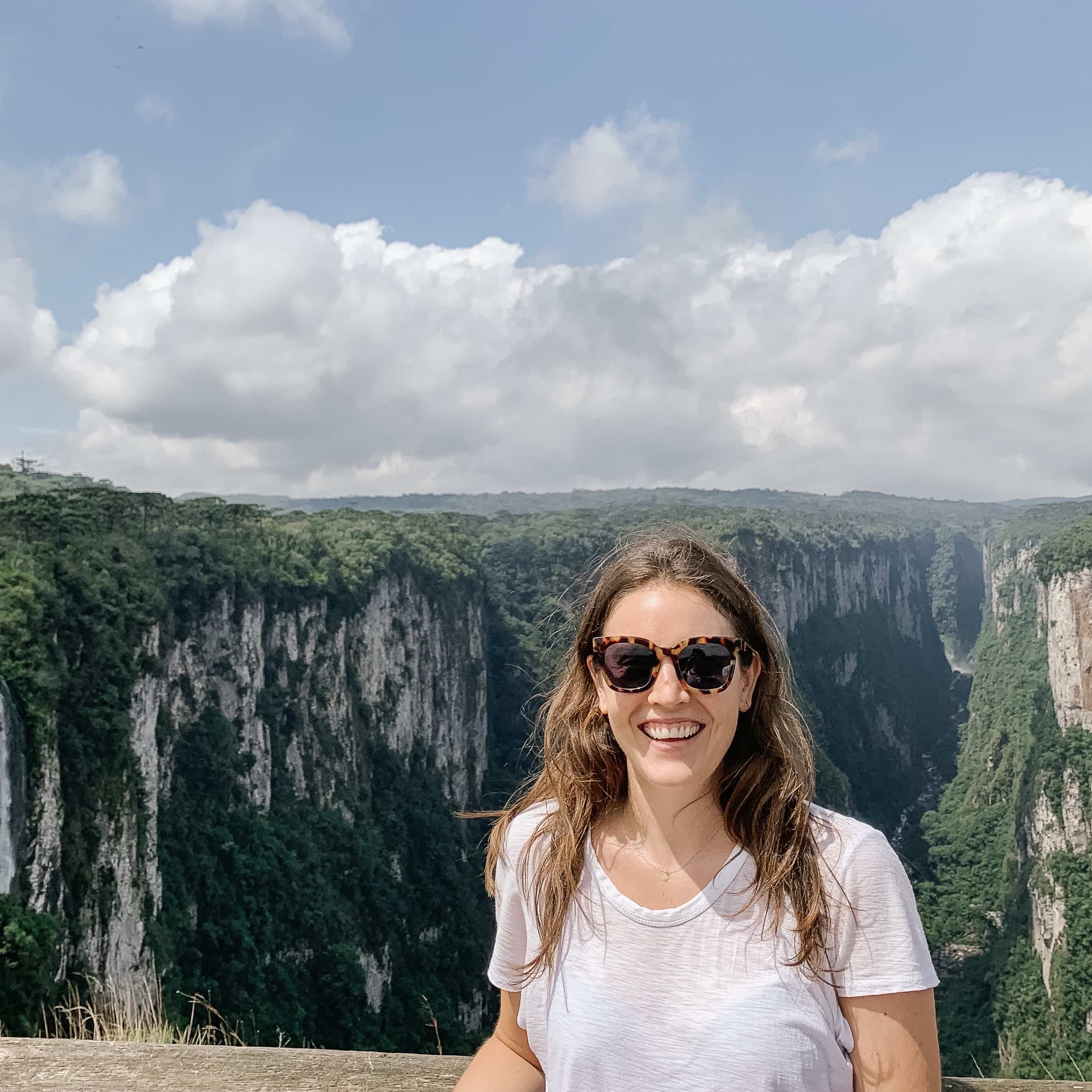 Emma standing in front of a canyon